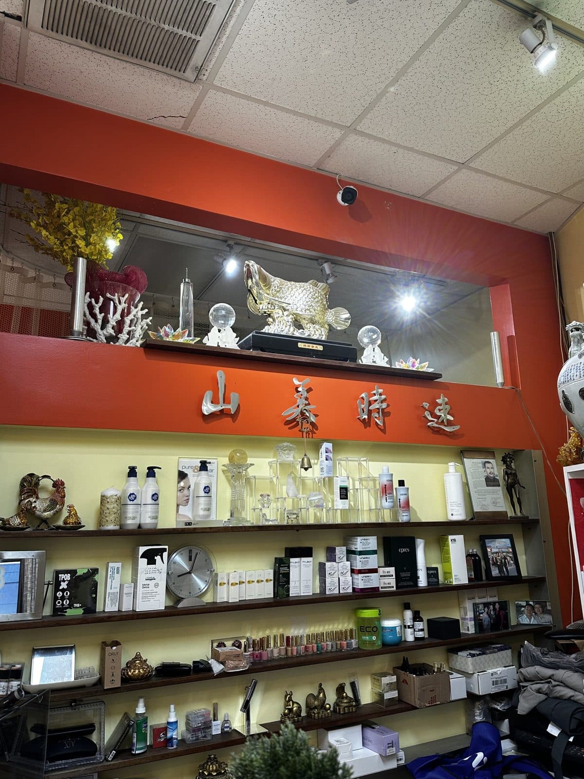 Retail shelf of hair and skin products inside the salon