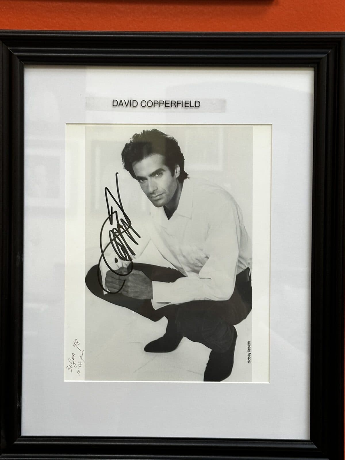 Signed black and white photo on the salon wall, labeled David Copperfield